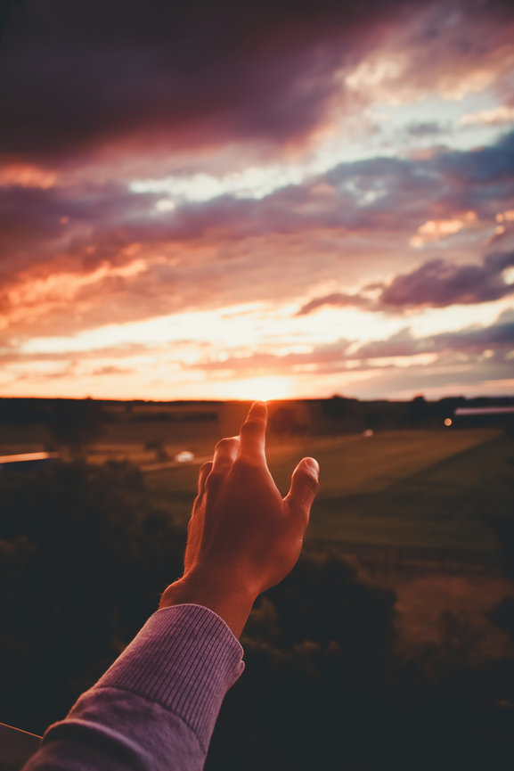 hand reaching to skies