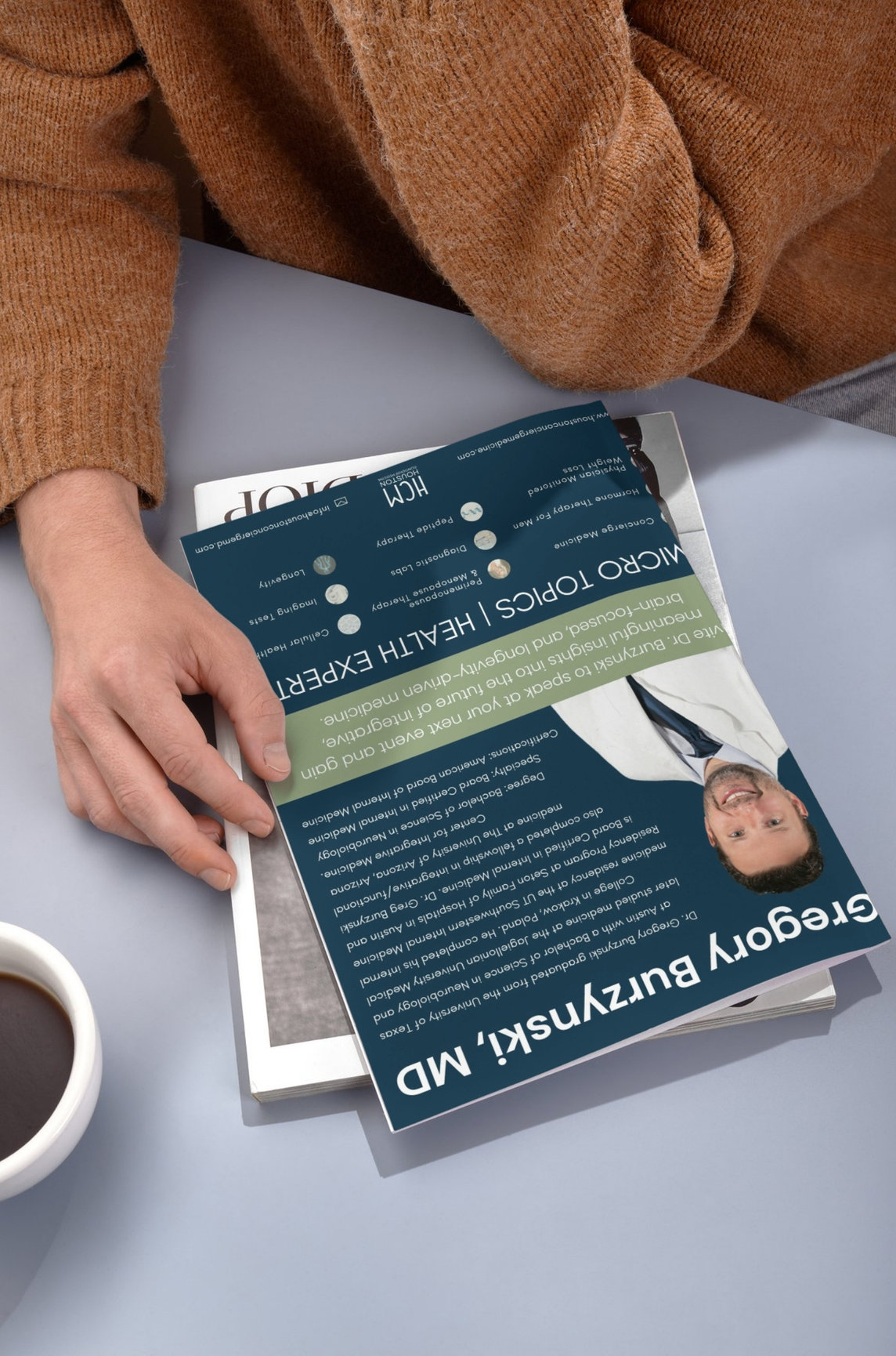 Dr. Gregory Burzynski speaker sheet displayed in a lifestyle setting